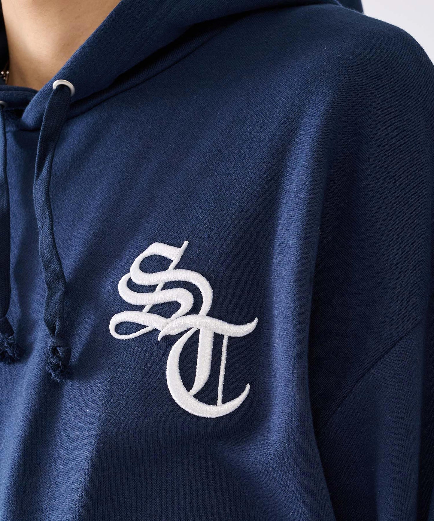 フリンジアップリケパーカー