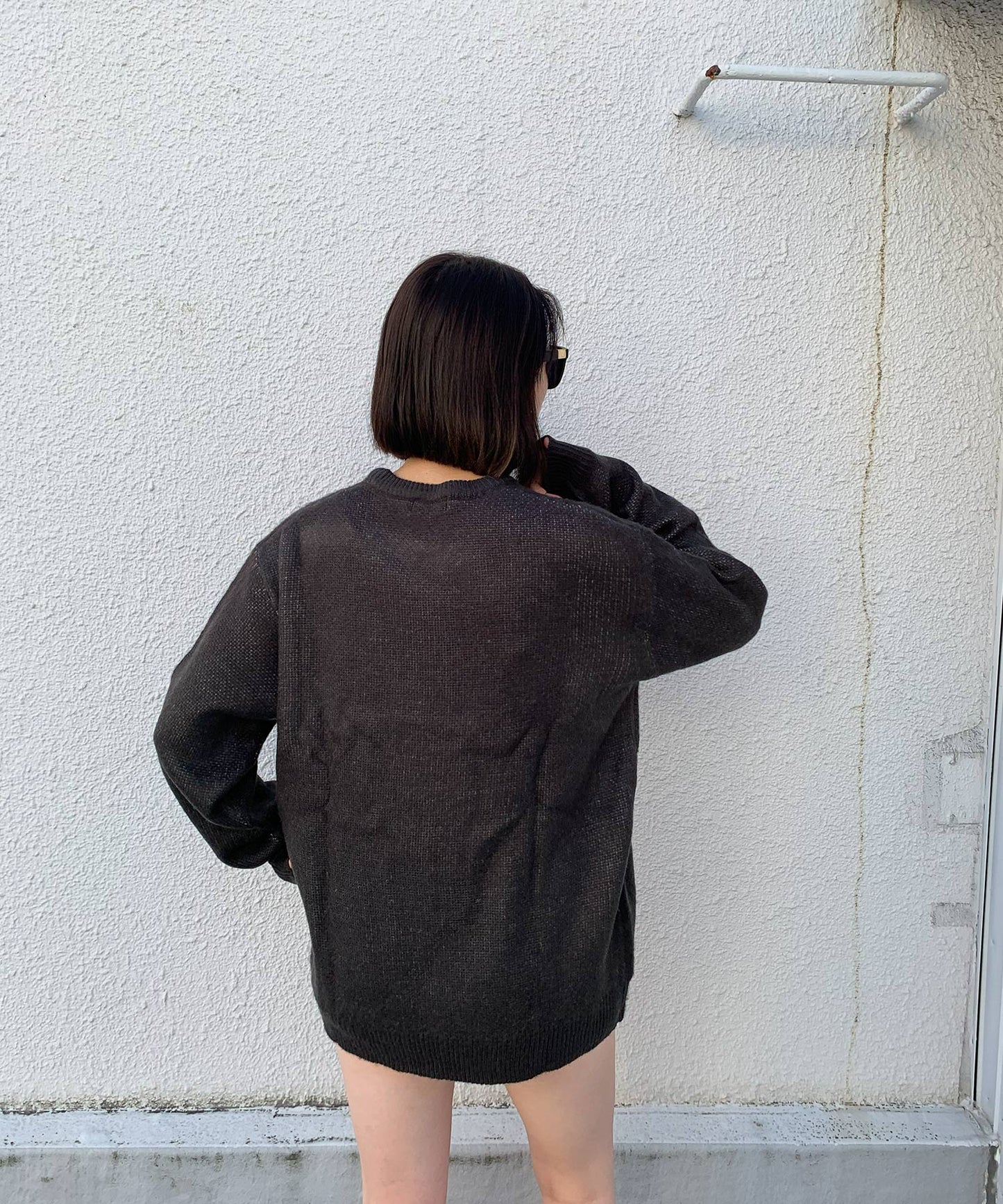 フェイスデザインクルーネックニット