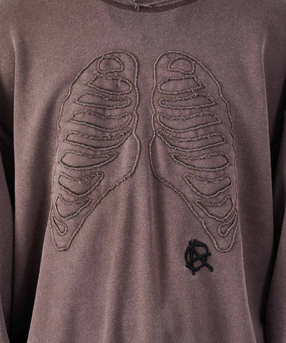 ボーンアップリケトレーナー