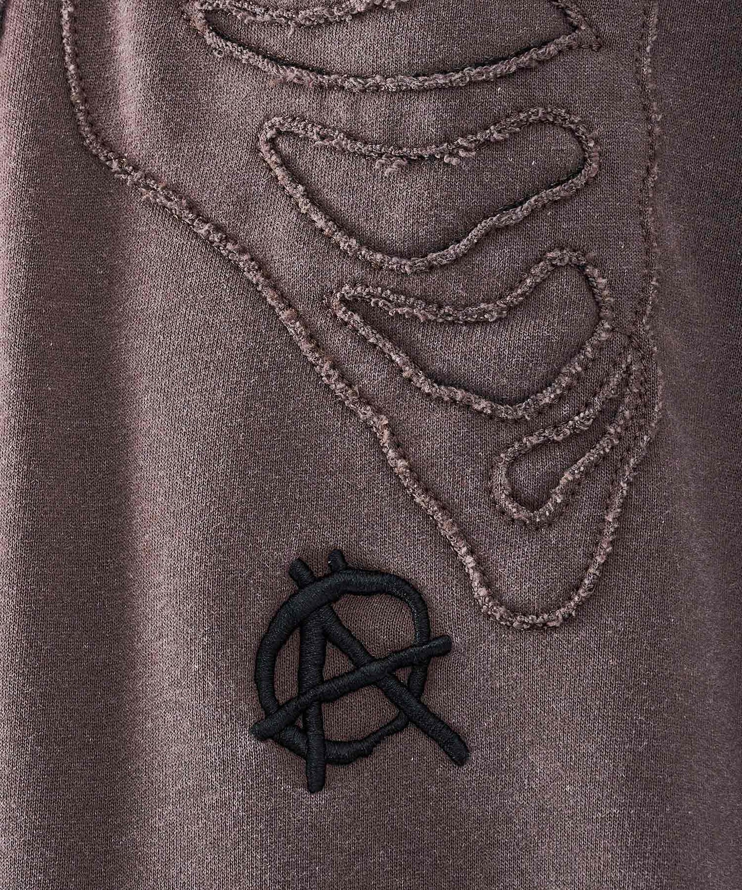 ボーンアップリケトレーナー